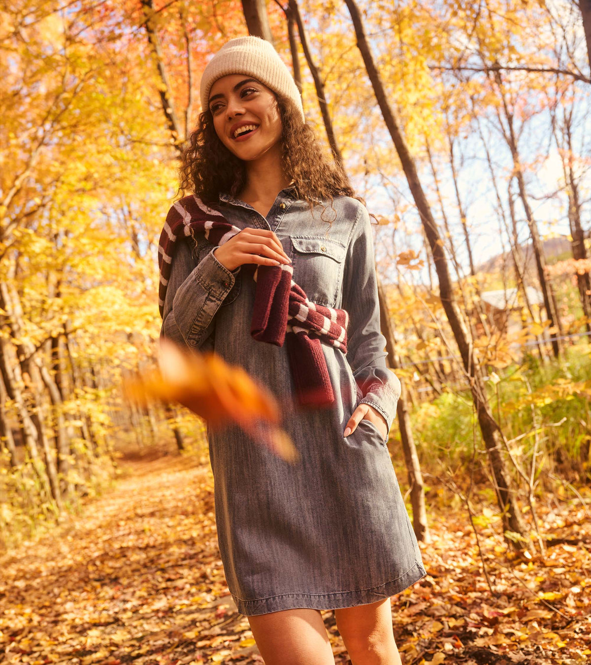 Blue acid rinse popover dress outdoors with chest pockets and partial button placket