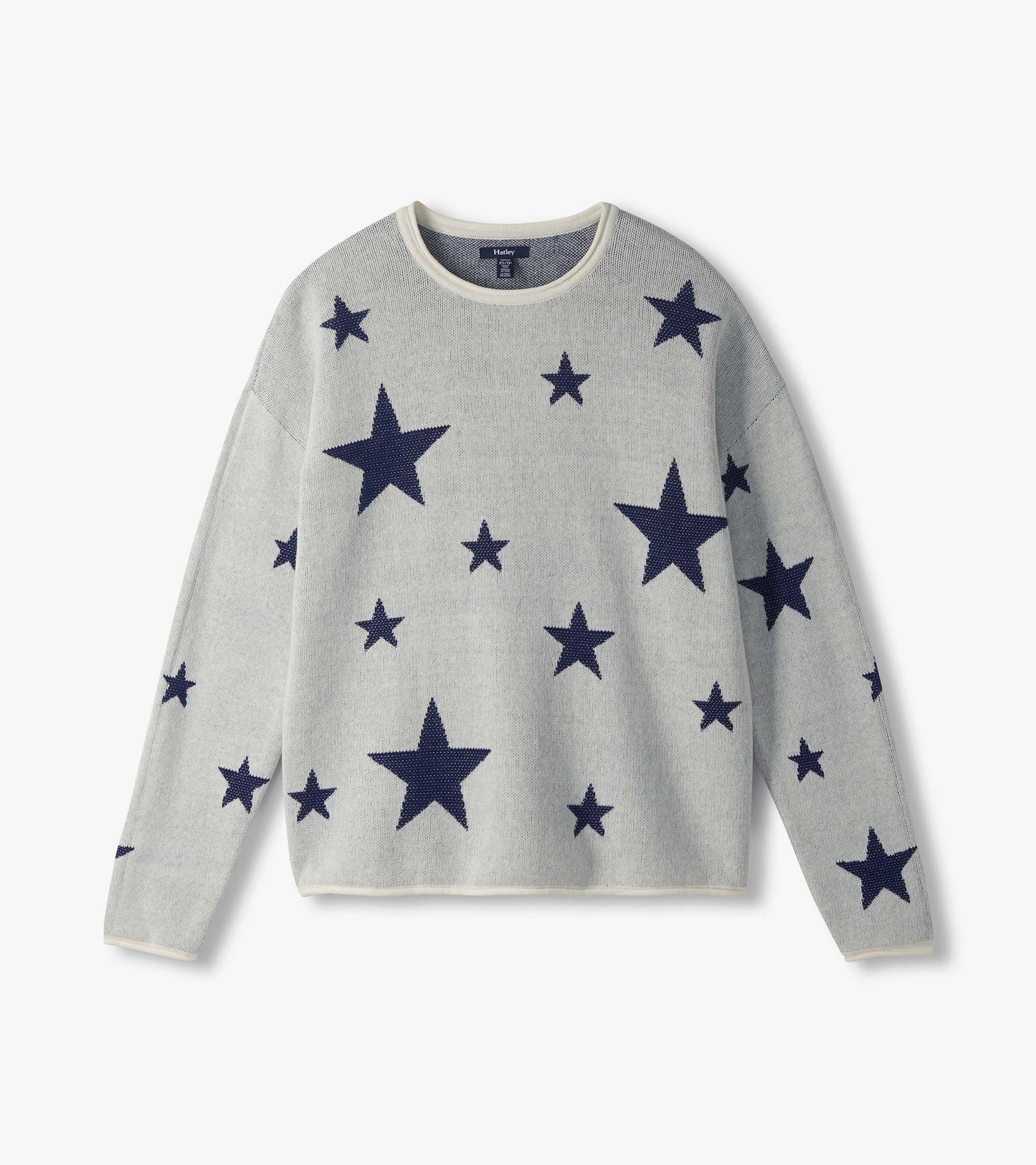 Flat lay front view of cream rolled edge sweater with scattered navy stars