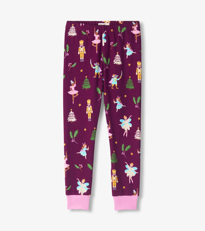 Girls pajama pants in purple with pink cuffs and nutcracker, ballerina, tree, star, and holly print
