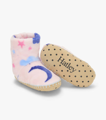 Pink slipper boots with moon and star print, including sole view with black dots and Hatley logo