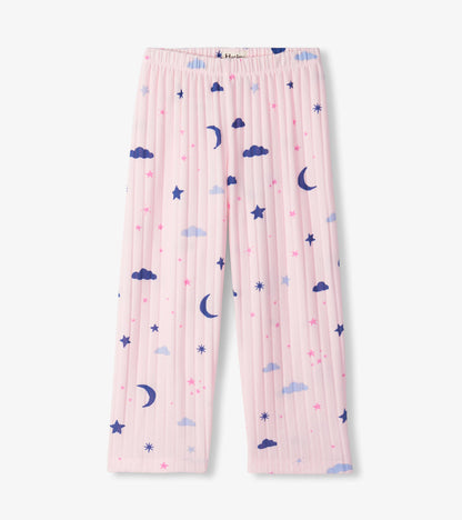 Pink pajama pants with elastic waist and moon, star, and cloud print