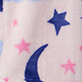 Pink fabric with blue crescent moon and stars pattern