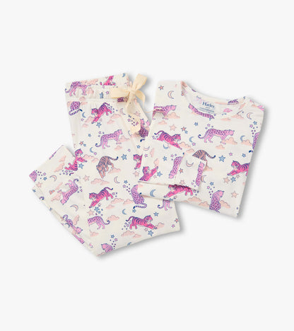 Folded cream pajama set with pink tiger, moon, and star print and drawstring jogger waist