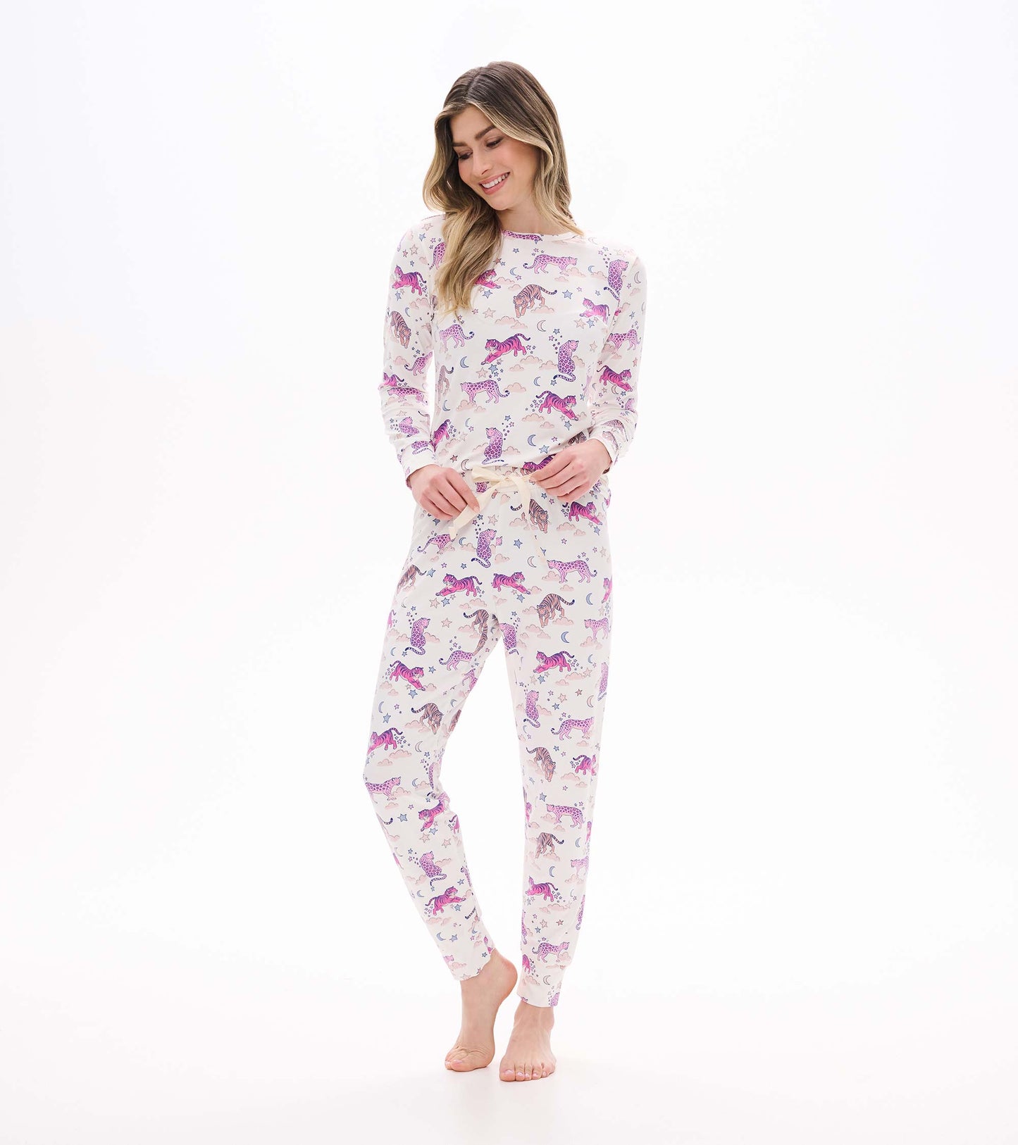 Women's cream tiger print pajama set shown from the front with long sleeves and tapered jogger pants