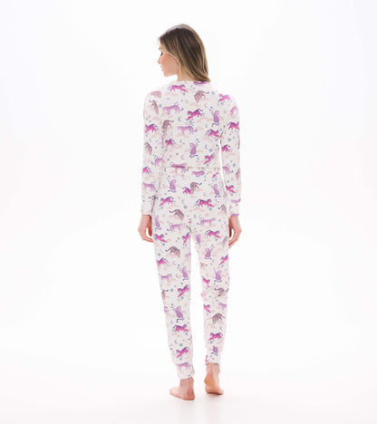 Back view of cream pajama set with pink tiger, moon, and star print and fitted jogger-style pants