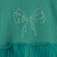 Teal fabric with a silver bow outline design and ruffled trim at the bottom