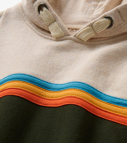 Close-up of oatmeal hoodie with drawcord hood and teal, gold, and rust wave stripe detail