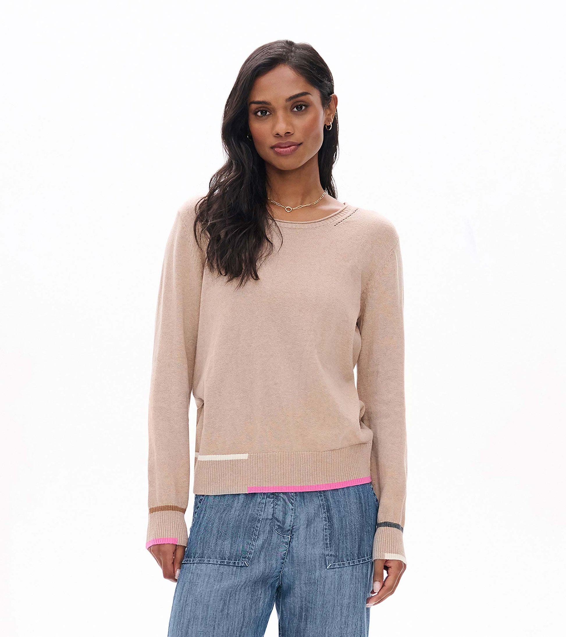 Front view of oatmeal crew neck sweater with pink, white and gray stripe accents at hem and cuffs