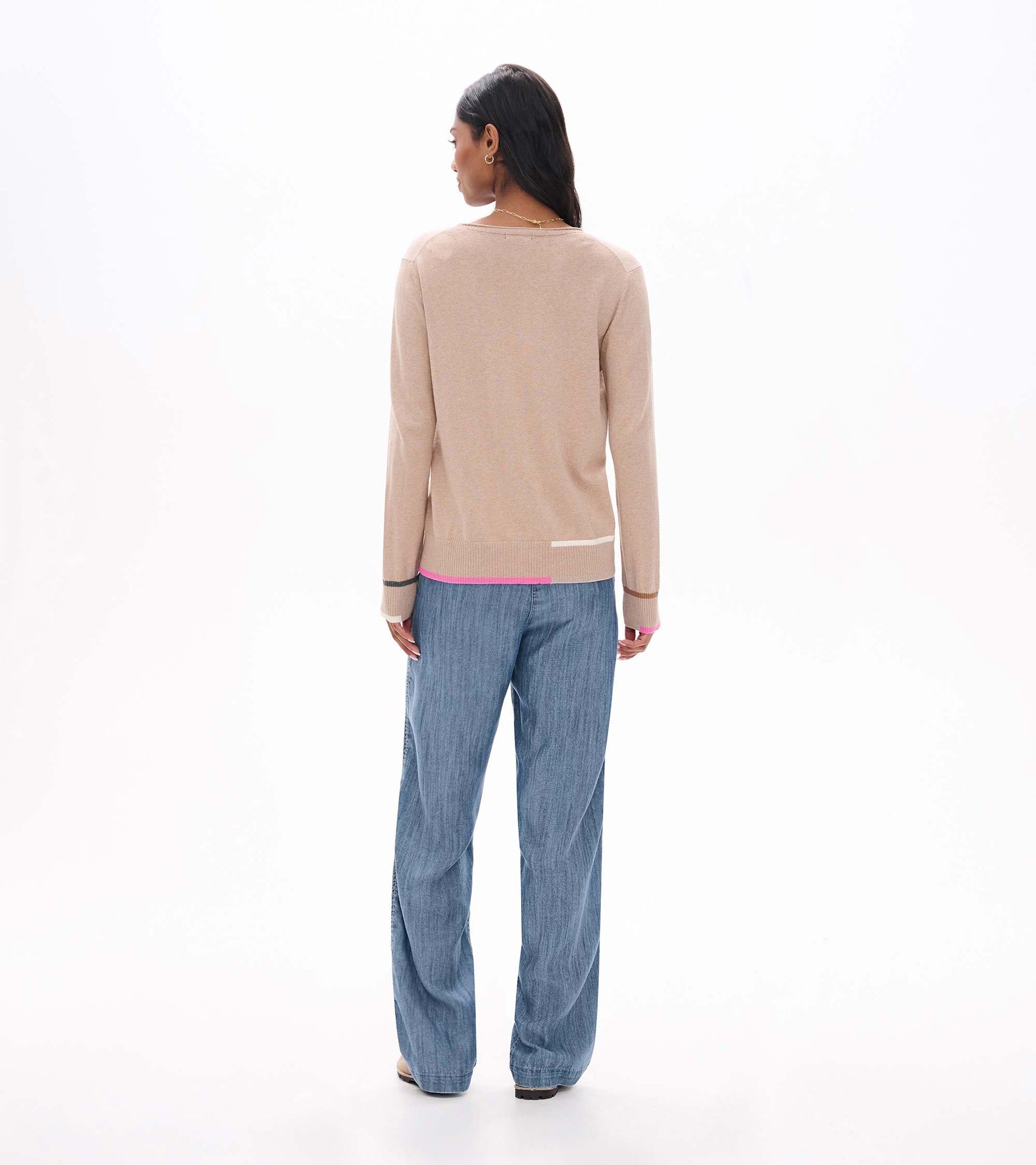 Back view of oatmeal crew neck sweater with pink hem stripe and contrast cuff trim