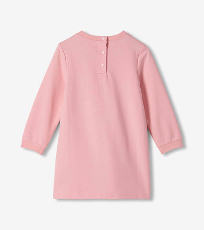 Back view of pink long sleeve toddler dress with snap placket at the neck