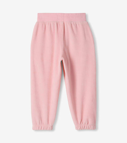 Back view of orchid pink cozy pants with an elastic waistband and elastic ankle cuffs