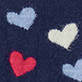 Three hearts on a navy background, two light blue and one red