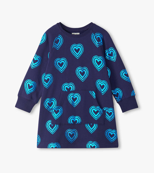 Front view of navy girls sweatshirt dress with bright heart print, long sleeves, ribbed cuffs, and kangaroo pocket