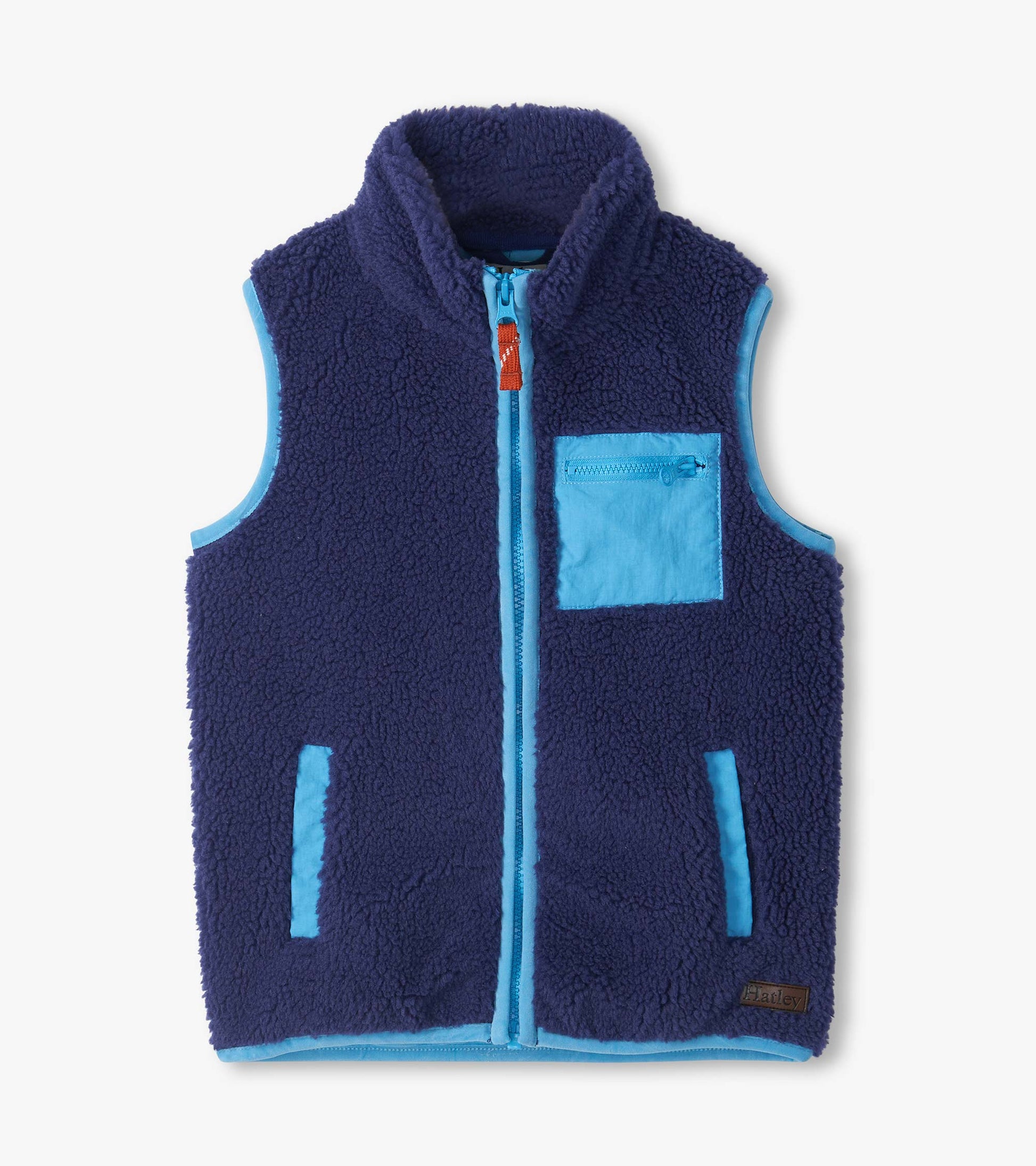 Patriot blue sherpa vest with light blue trim, front zip, zip chest pocket, and two front pockets