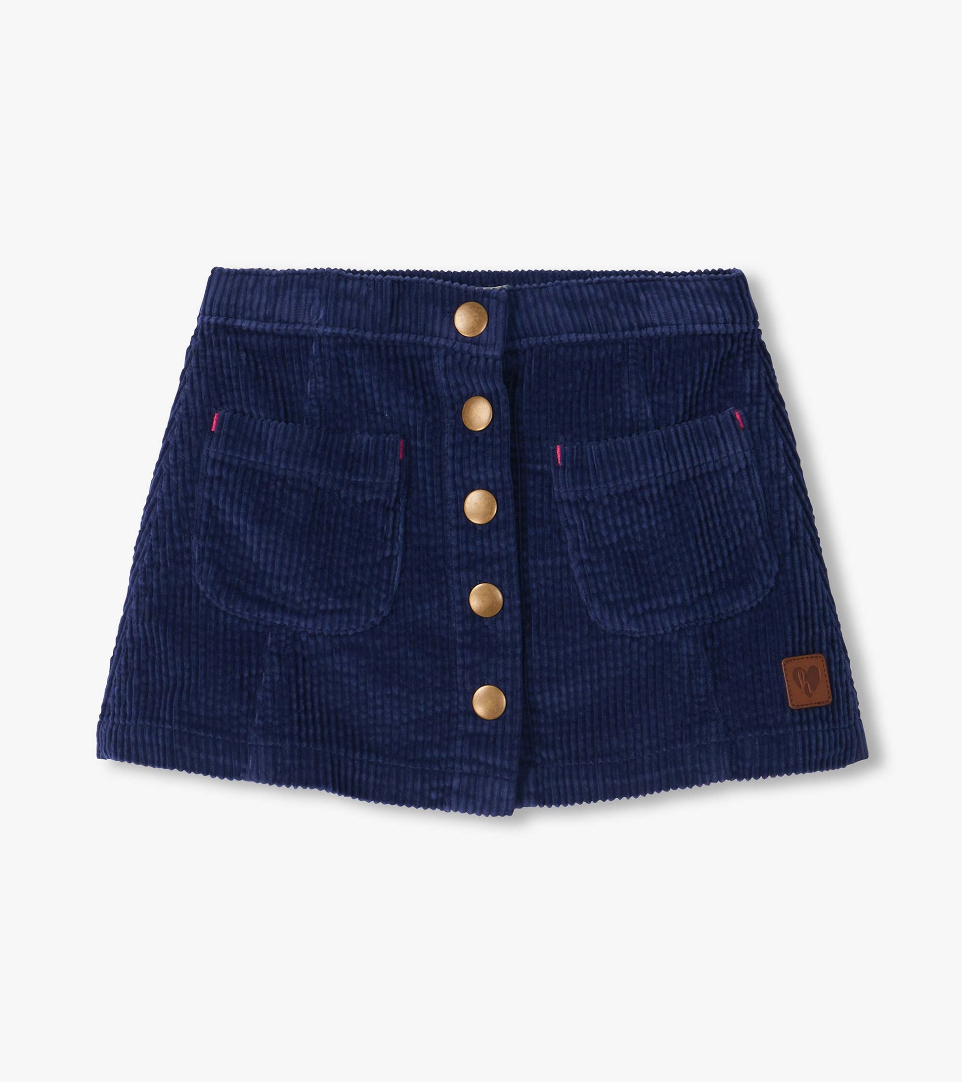 Patriot blue A-line skirt with front snap buttons, two front pockets, and a small patch near the hem