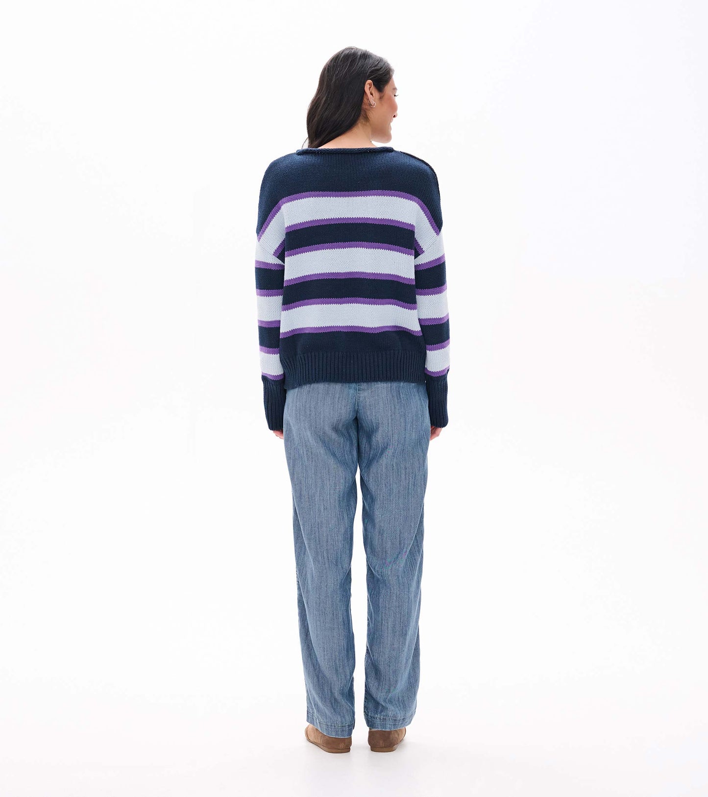 Back view of striped rolled collar sweater with navy, white, and purple horizontal bands