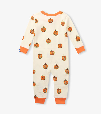 Back view of baby sleeper in cream with orange pumpkin print and orange cuffs
