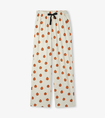 Cream wide-leg pajama pants with orange jack-o'-lantern print and black drawstring waist