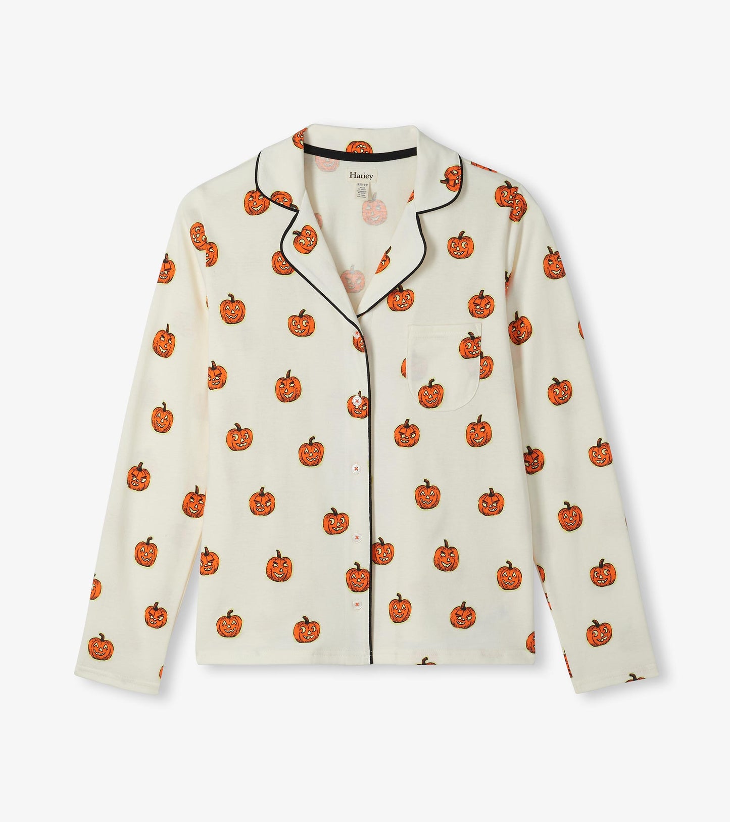 Cream long-sleeve pajama top with orange jack-o'-lantern print, black piping, and chest pocket