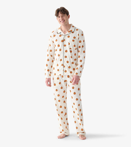 Men's cream two-piece pajama set with orange pumpkin print, black piping, chest pocket, and straight-leg pants