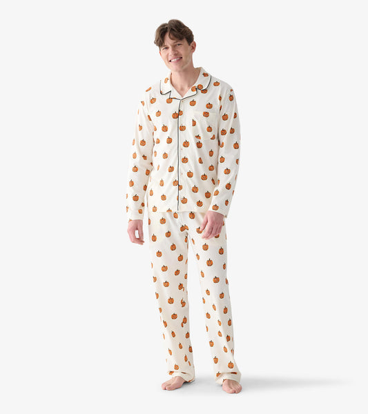 Men's cream two-piece pajama set with orange pumpkin print, black piping, chest pocket, and straight-leg pants