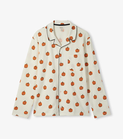 Cream long-sleeve pajama shirt with orange pumpkin print, black piping, and a chest pocket