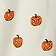 Four small orange jack-o'-lantern faces on a white background