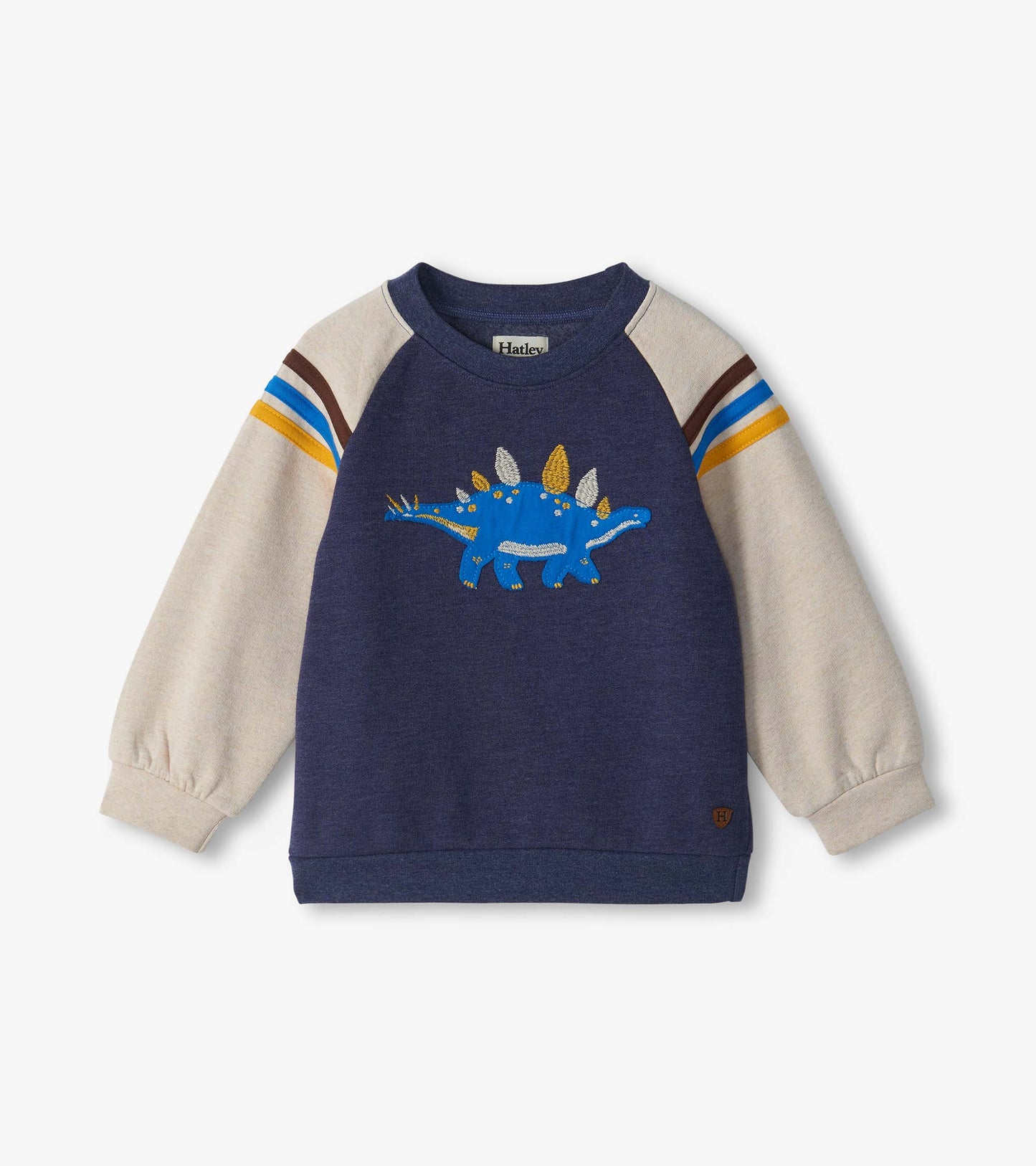 Kids pullover sweatshirt with navy body, cream sleeves, striped shoulders, and blue stegosaurus graphic