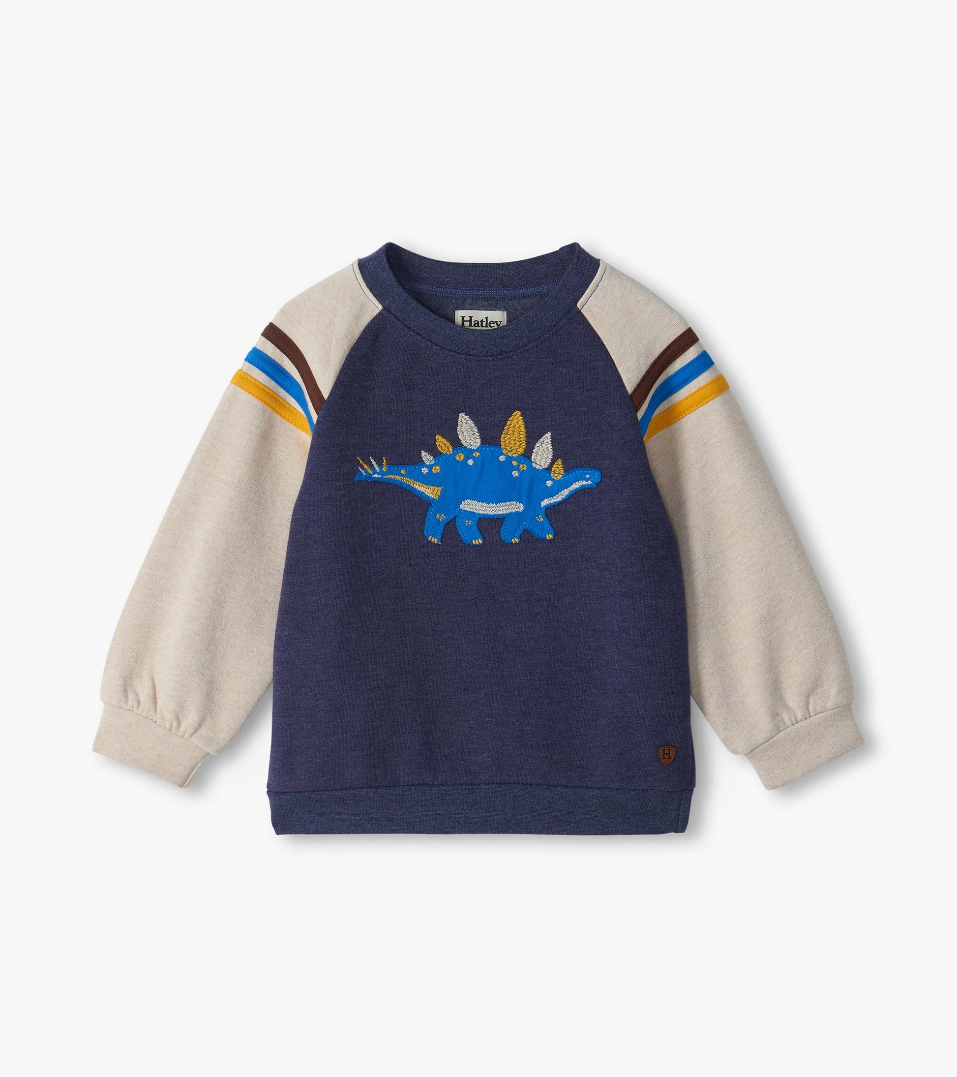 Kids pullover sweatshirt with navy body, cream sleeves, striped shoulders, and blue stegosaurus graphic