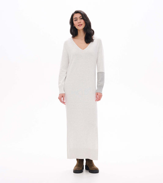 Front view of pale grey melange maxi sweater dress with V-neck and contrast right sleeve detail