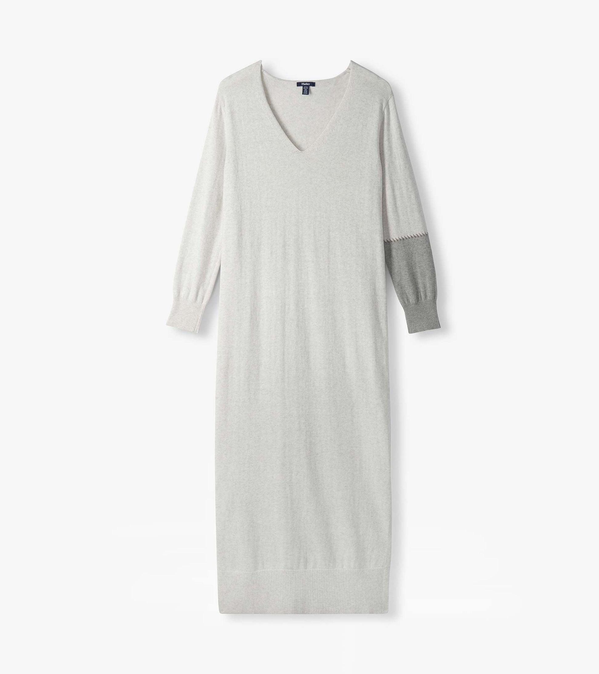 Pale grey melange maxi sweater dress laid flat with V-neck, ribbed hem, and contrast right sleeve panel