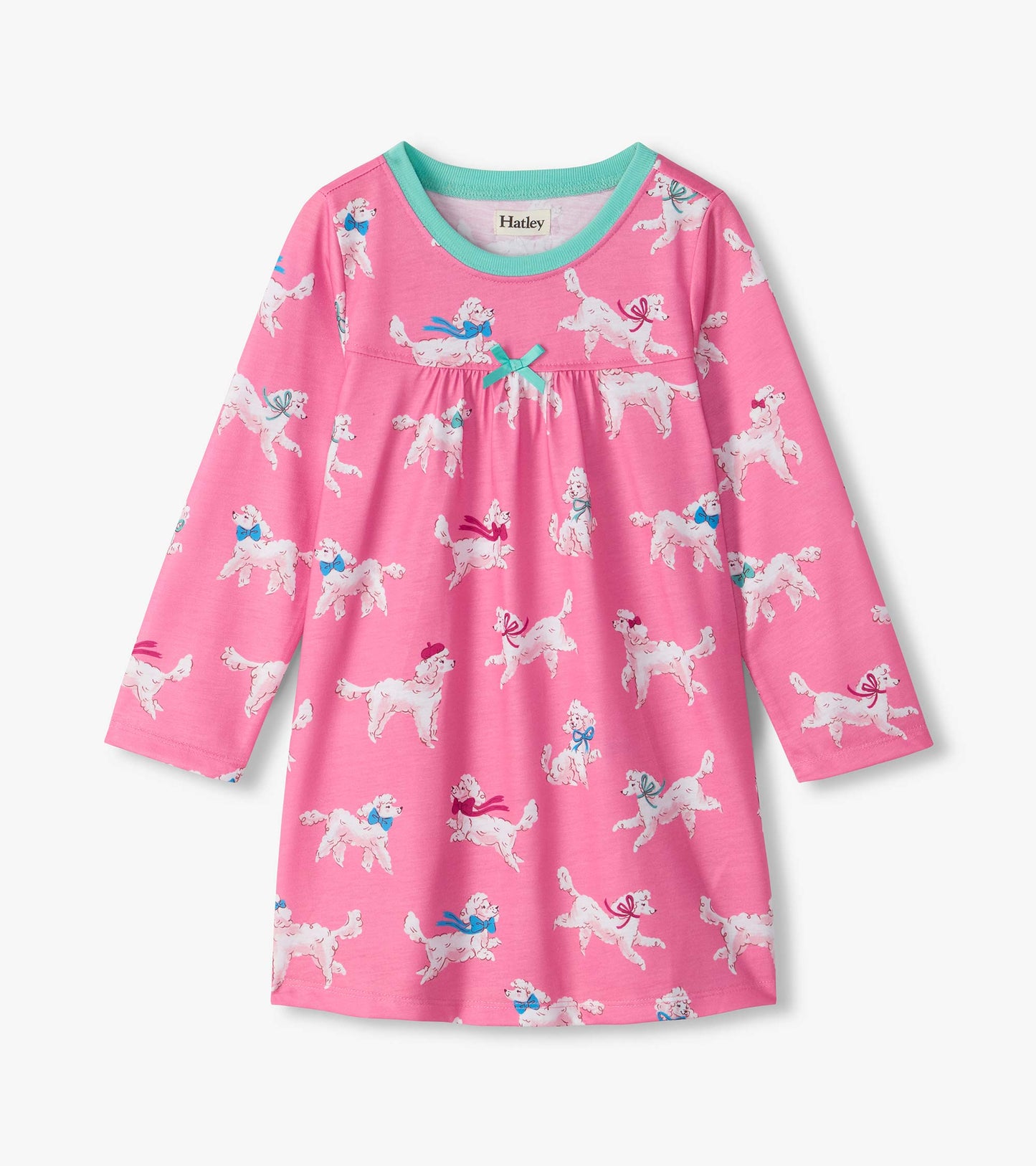 Pink long-sleeve nightdress with white poodle print, aqua neckline, and small bow at the gathered waist