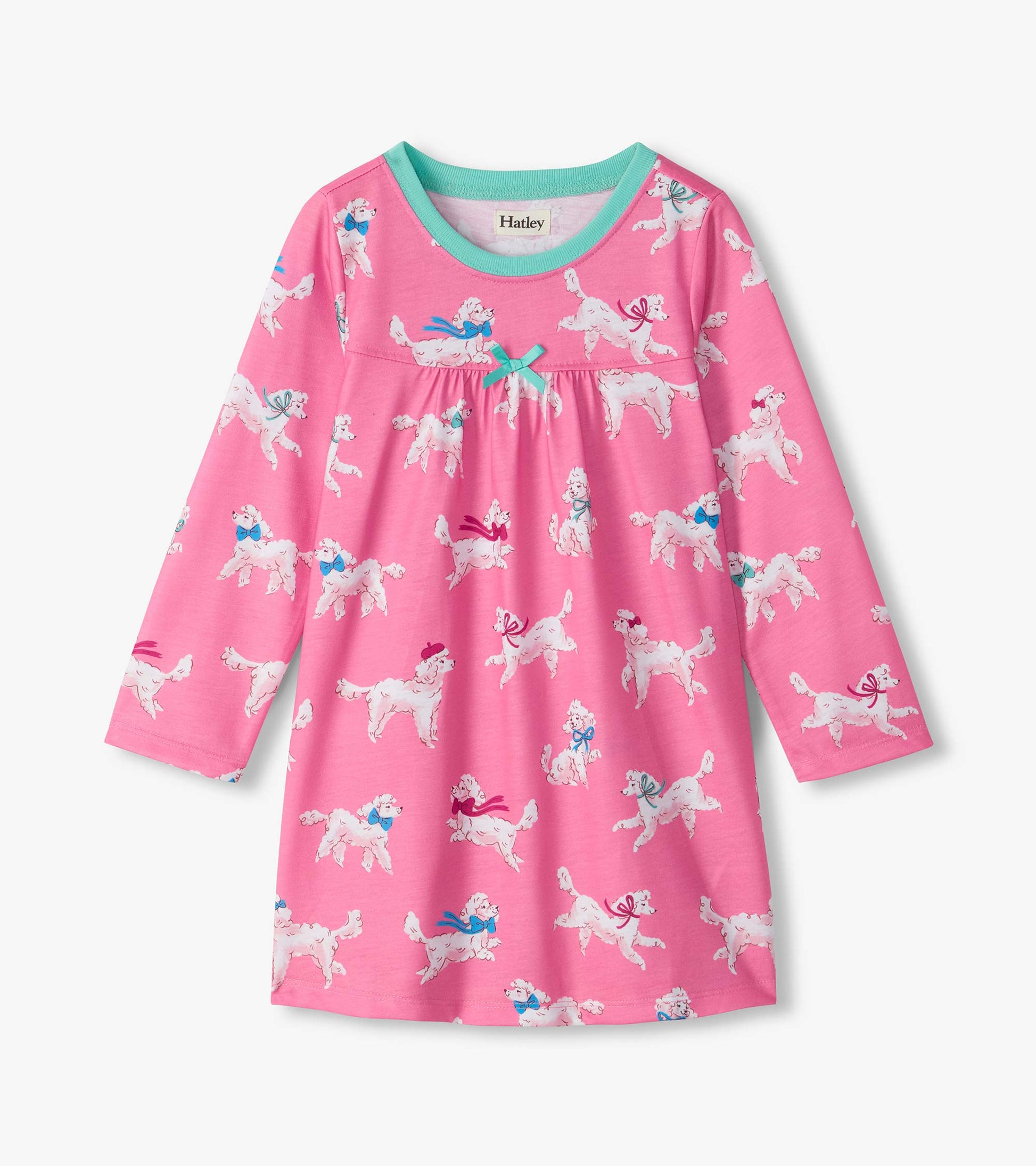Pink long-sleeve nightdress with white poodle print, aqua neckline, and small bow at the gathered waist