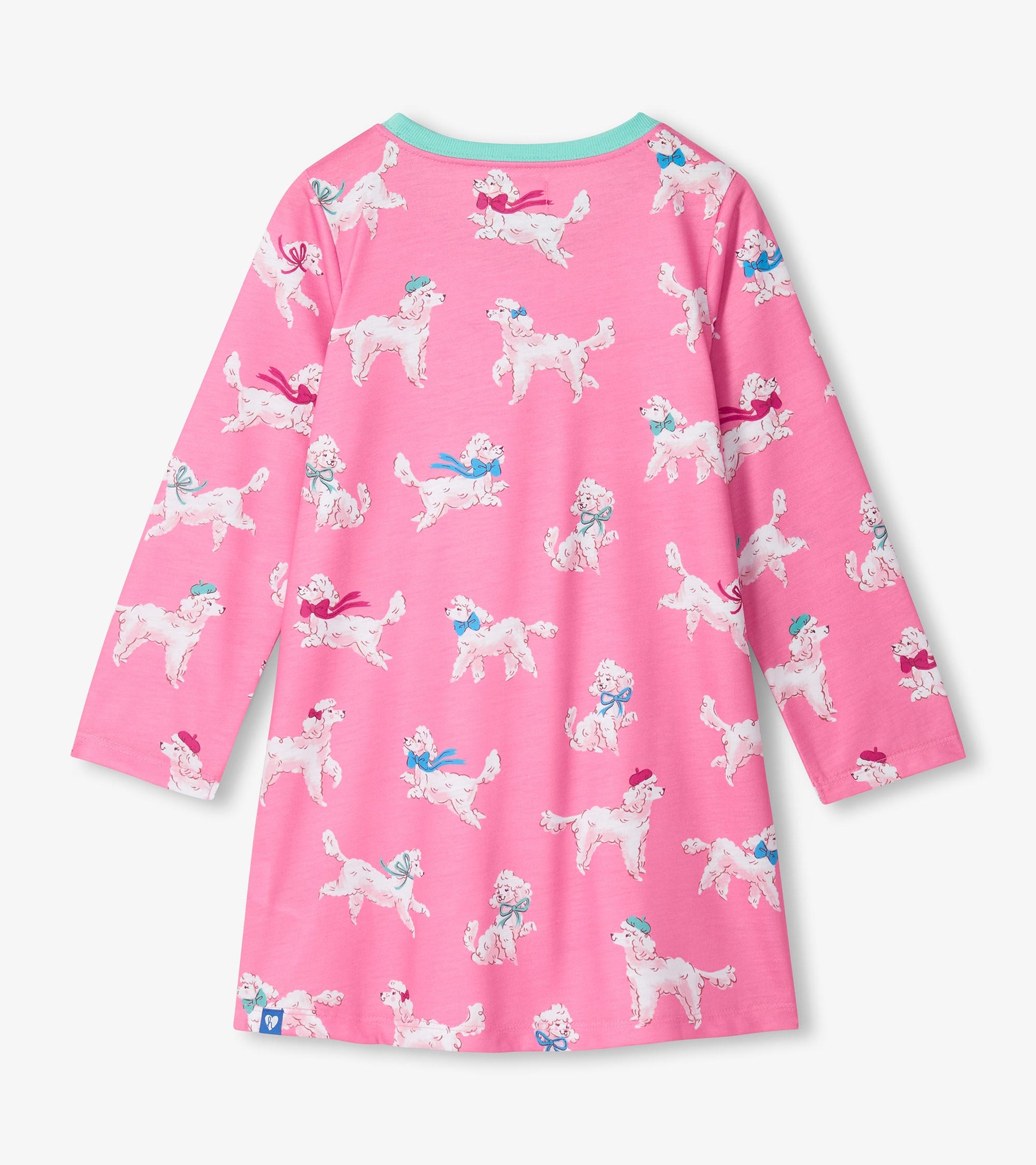 Back view of girls pink nightdress with white poodle print, teal neckline, and long sleeves