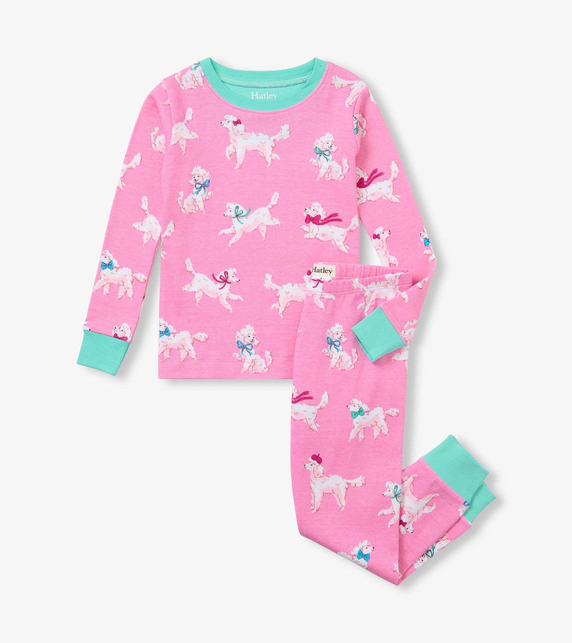 Kids pink pajama set with white poodle print, aqua trim, long sleeve top, and matching pants