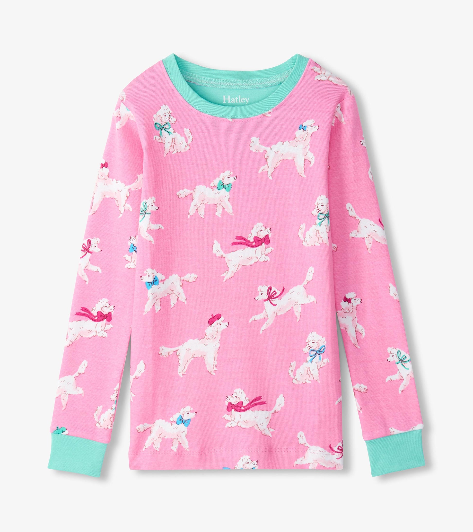 Girls pajama top in pink with white poodle print and mint green neckline and sleeve cuffs