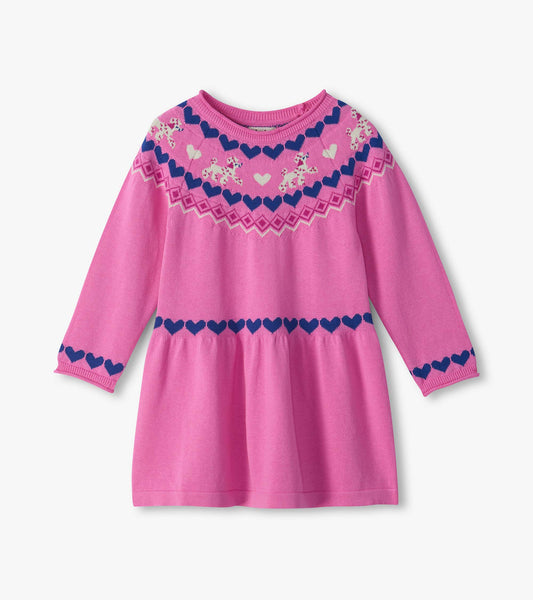 Pink flared sweater dress with long sleeves, blue heart trim, and white dog and heart pattern at the yoke