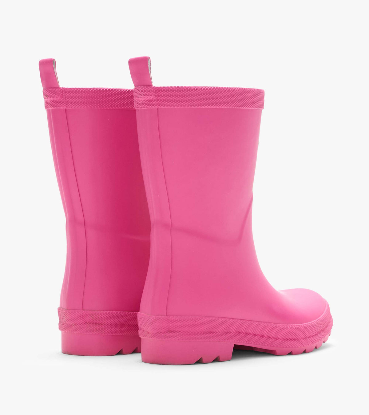 Back view of bright pink matte rain boots with pull tabs and textured trim at the top and sole