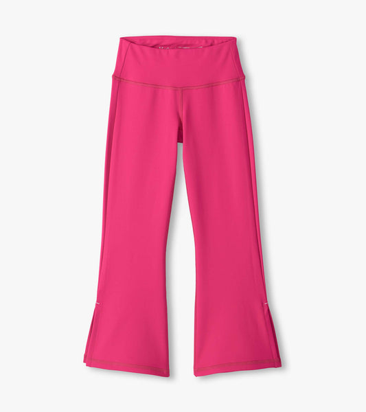 Bright pink active flared pants with a wide waistband and full-length legs