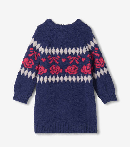 Back view of girls navy sweater dress with pink rose and bow pattern, white diamonds, and long sleeves