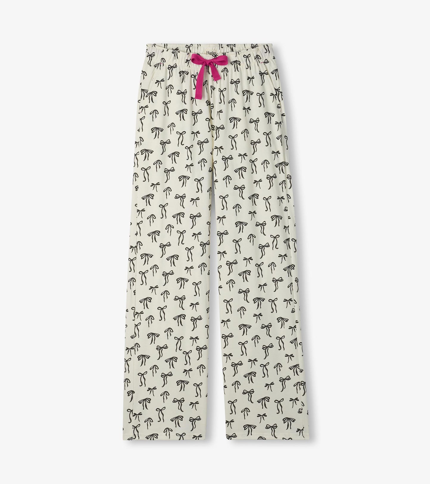 Cream pajama pants with black bow print and a bright pink drawstring at the elastic waist