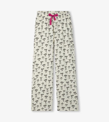 Cream pajama pants with black bow print and a bright pink drawstring at the elastic waist