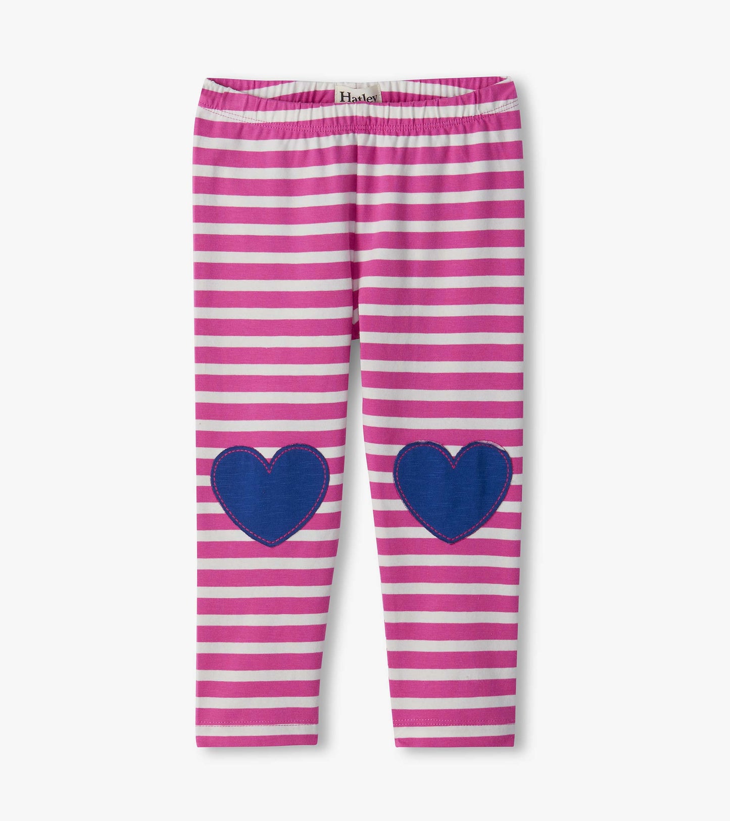 Pink and white striped infant leggings with blue heart knee patches, front view