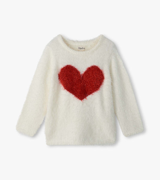 Cream fuzzy girls sweater with long sleeves and a large red heart on the front