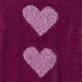Two pink hearts on a dark magenta background