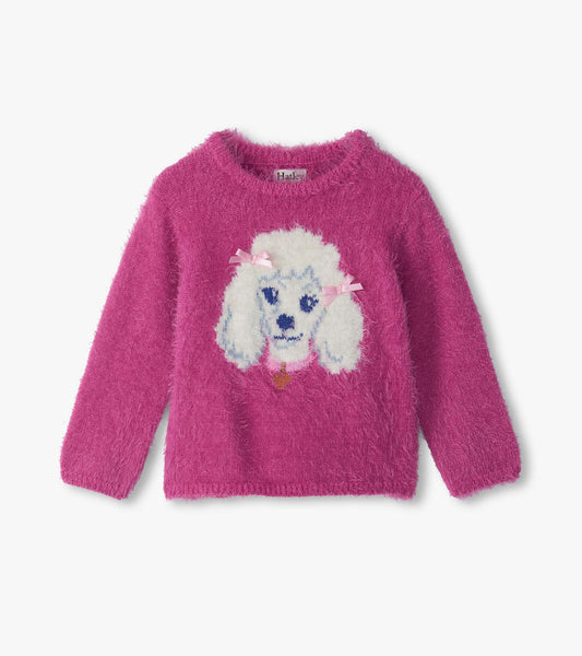 Bright pink fuzzy sweater with a white poodle graphic and pink bows on the front