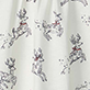White fabric with a repeating blue and red floral pattern