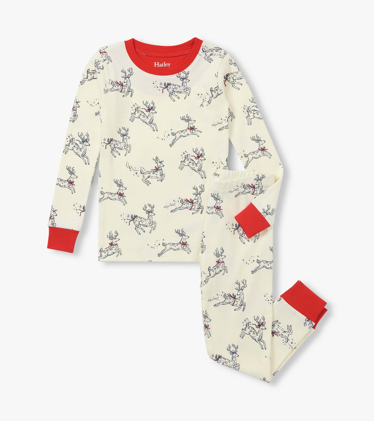 Girls pajama set with cream reindeer print, red collar, and red cuffs on sleeves and pant legs