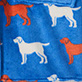 Blue fabric with white and orange dog silhouettes