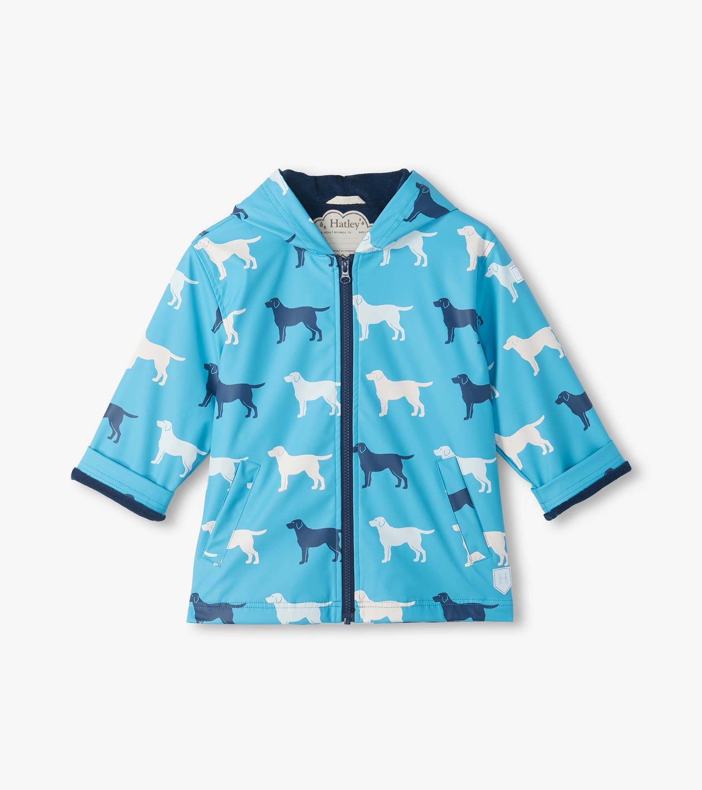 Front view of blue hooded rain coat with zip front, patch pockets, and white and navy dog print